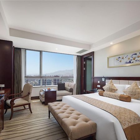 New Century Hotel Qingdao Bagian luar foto