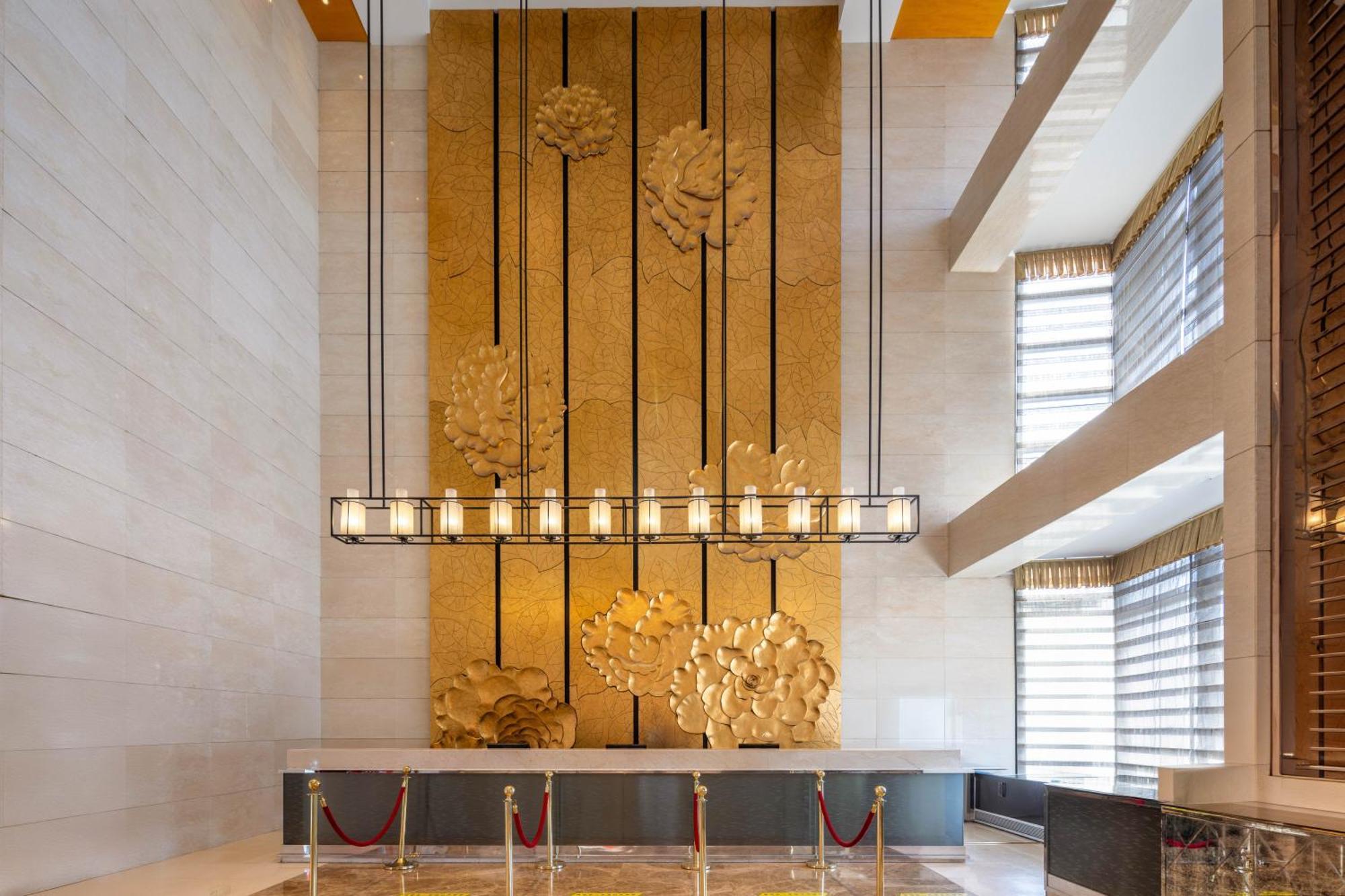 New Century Hotel Qingdao Bagian luar foto